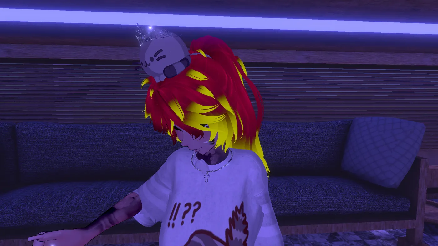 Players relaxing together on a couch in a lounge world